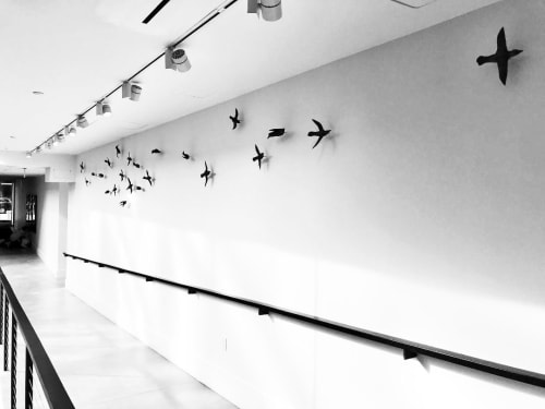 Installation in Brooklyn, NY, 30 clay birds in flight | Sculptures by Susan Hostetler Studio | 420 Kent Luxury Brooklyn Apartments in Brooklyn