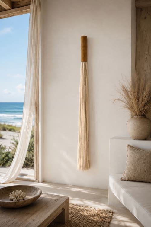 Single tassel hanging on the wall | Wall Hangings by Olivia Fiber Art