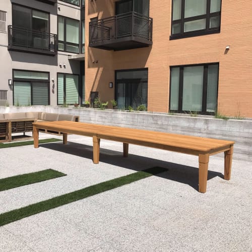 19' Black Locust outdoor dining table | Tables by Heirloom Custom Woodworks LLC | Millennium at West End in St. Louis Park