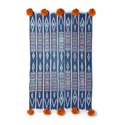 baoule pom pom throw bold indigo stripe/caramel poms | Linens & Bedding by Charlie Sprout