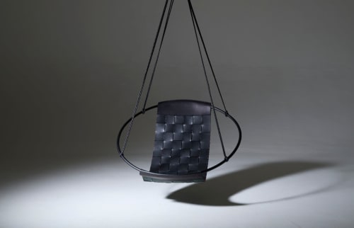 Genuine Leather Woven into a Hanging Swing Chair | Chairs by Studio Stirling