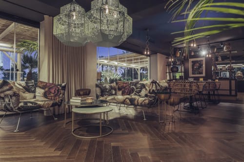 Caged Beauty | Chandeliers by JSPR | Boho Club Restaurant in Marbella