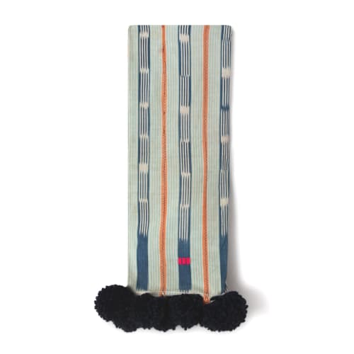 baoule pom pom throw light stripe/indigo poms | Blanket in Linens & Bedding by Charlie Sprout