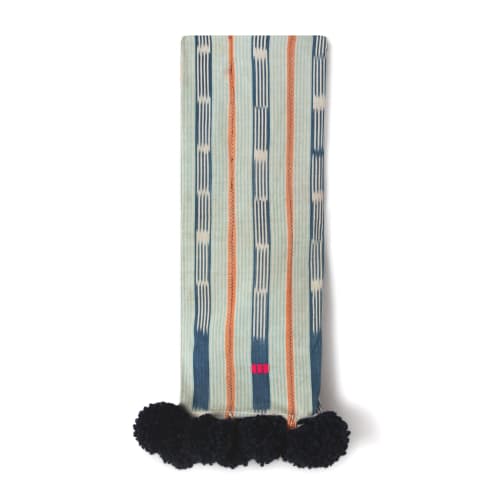 baoule pom pom throw light stripe/indigo poms | Linens & Bedding by Charlie Sprout