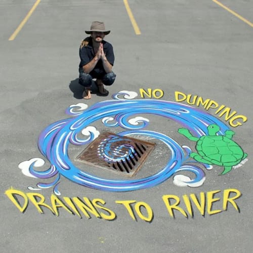 No Dumping Drains to River, Pavement Painting | Paintings by Shane Wilcox | Canada Games Aquatic Centre in London