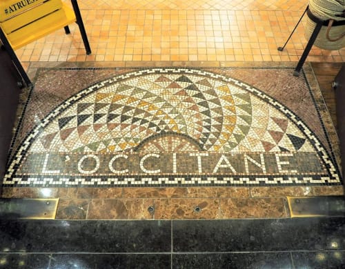Stone tile mosaic floor entryway | Signage by JK Mosaic, LLC | Time Warner Center in New York