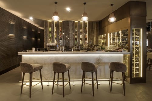 Favo Natural Stone Wall Tiles | Tiles by Lithos Design | Roberto's Ristorante in دبي