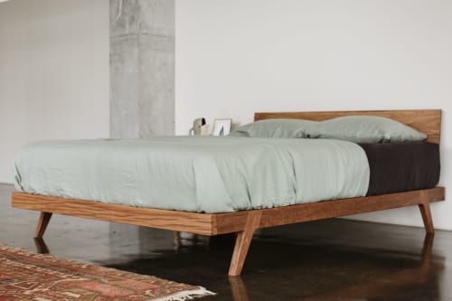 Queen size maple bed frame with live edge headboard by Rosehammer