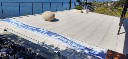 Mosaic patio inlay suggesting a river | Public Mosaics by JK Mosaic, LLC