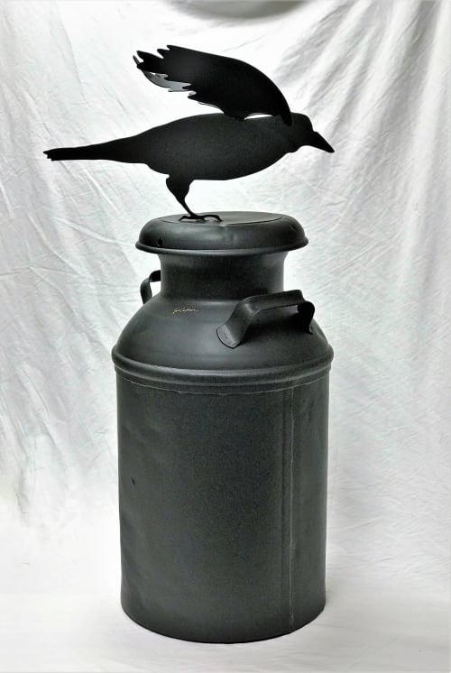 The RAVEN on an anique milk can. | Sculptures by jim collins sculpture
