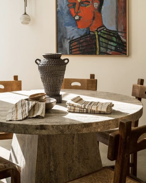 Silver Travertine Round Pedestal Dining Table | Tables by Phidias Atelier