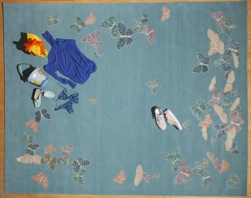 Spirit in the sky. Blue background rug with butterflies | Rugs by Sergio Mannino Studio