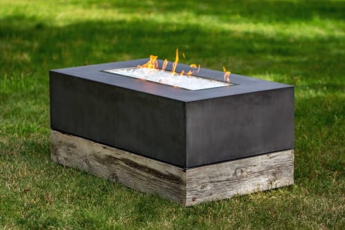 Concrete and barnwood self-contained firepit with hidden pro | Fireplaces by Woven 3 Design