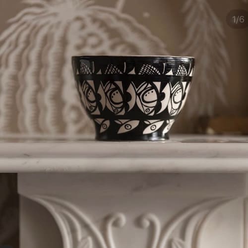 Black and white free-hand repeat pattern decorated medium bowl.