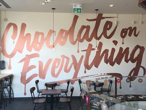 Chocolats Favoris mural | Murals by Christopher Rouleau | Chocolats Favoris in Aurora