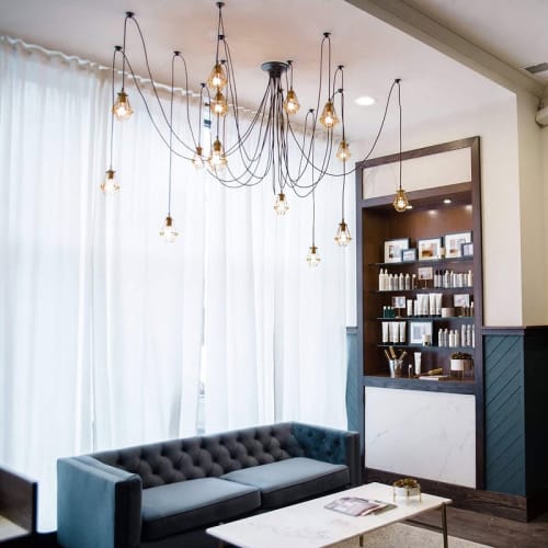 Swag Chandeliers with Brass Hinge Cages | Chandeliers by Hangout Lighting | Base Salon in Chicago