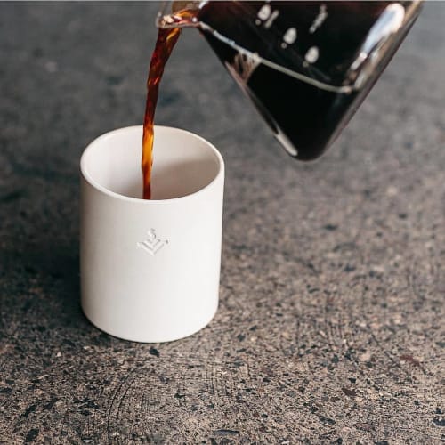 Vesta's custom-stamped 12oz. Smooth Cup | Cups by Tiny Badger Ceramics | Vesta Coffee Roasters in Las Vegas