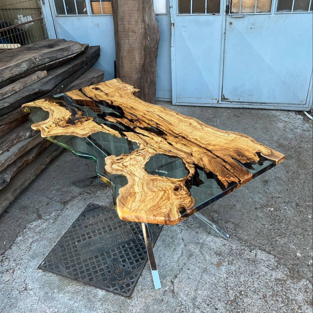 Live edge Clear Epoxy Table made from olive wood by Ironscustomwood
