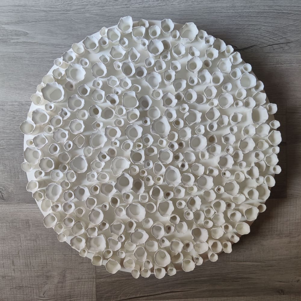 White wall sculpture on a 20" round canvas by Art By Natasha Kanevski