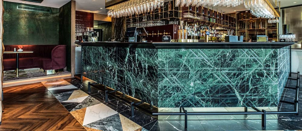 Tartan marble wall covering by Lithos Design at Van der Valk Hotel ...