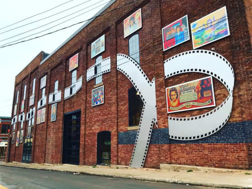 Steel Sculpture Film Reel | Wall Sculpture in Wall Hangings by Christian Toth Art | Roseland Theatre in New Glasgow. Item composed of steel