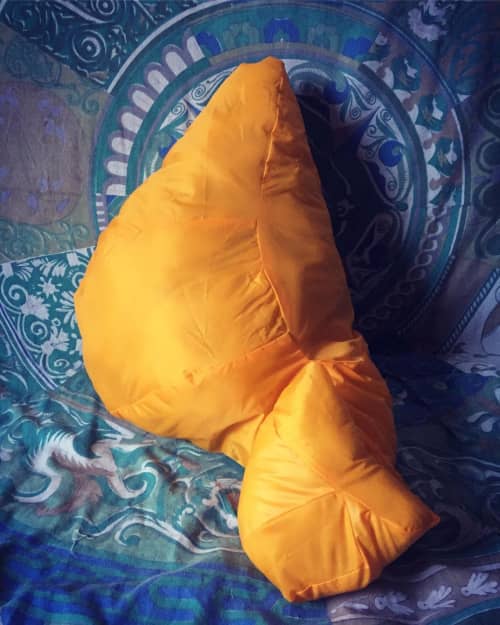 Mustard-colored soft sculpture | Sculptures by Lily Erb | Mudhouse Coffee 10th Street in Charlottesville