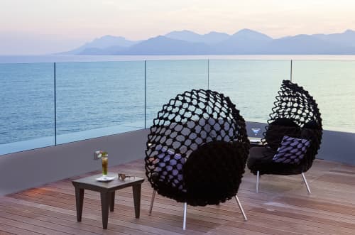 Dragnet Lounge Chair | Chairs by Kenneth Cobonpue | Radisson Blu 1835 Hotel & Thalasso, Cannes, France in Cannes