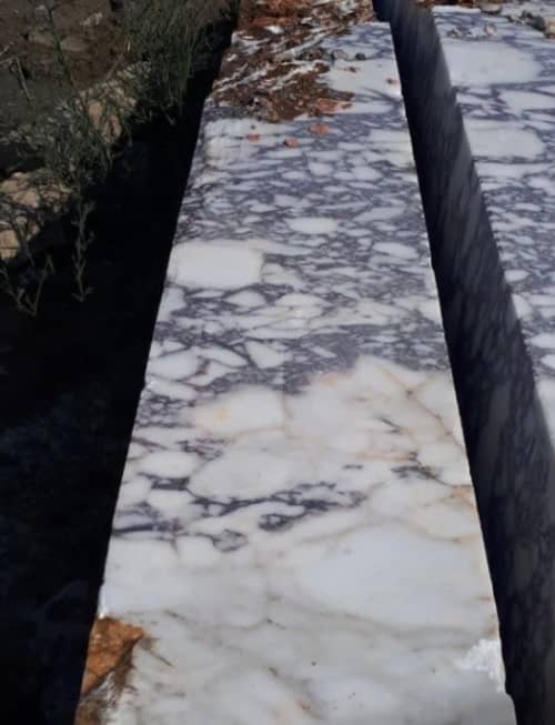 Calacatta Viola Marble Sink: Hand Carved Wall Mount Washbasin | Water Fixtures by AEGEAN MARBLE ARTISAN ATELIER