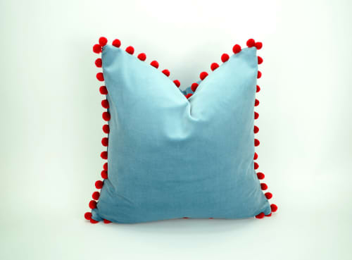 blue velvet pillow with red pom poms // blue and red pillow | Pillows by Velvet Fringe