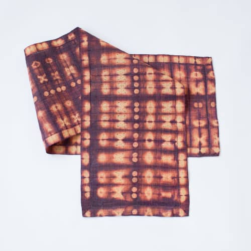 Raffia Shibori Table Runner - Cocoon & Moth Pattern-Burgundy | Linens & Bedding by Tanana Madagascar. Item composed of fabric