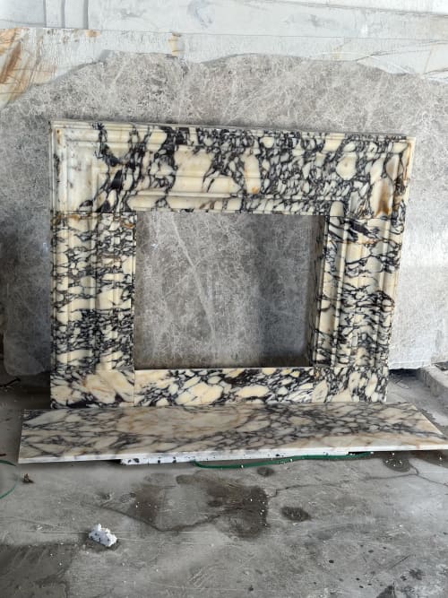 Hand Carved Calacatta Viola Marble Fireplace Mantel: Custom Order | Fireplaces by AEGEAN MARBLE ARTISAN ATELIER