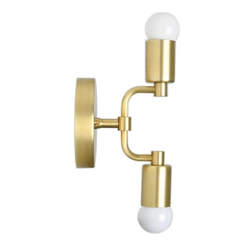 Calvert | Sconces by Illuminate Vintage. Item composed of brass