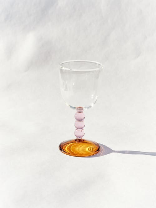 Hand Blown Circle Stem Wine Glass in Pink/Amber | Drinkware by Barton Croft. Item made of glass works with country & farmhouse & japandi style