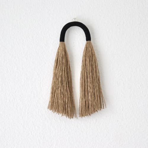 Small Jute Tassel with black arch | Wall Sculpture in Wall Hangings by YASHI DESIGNS by Bharti Trivedi