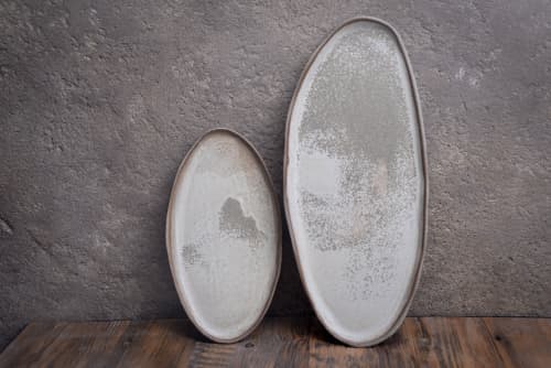 Organic natural shape elongated stoneware plates in grey | Dinnerware by Laima Ceramics. Item made of stoneware compatible with minimalism and contemporary style