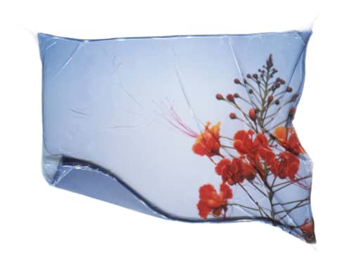 Folded up the blue + orange, so they fit in an envelope | Photography by She Hit Pause. Item made of paper