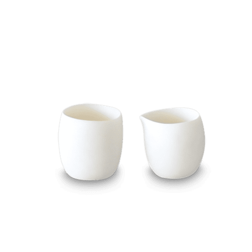 Sculpt Small Creamer & Sugar Set | Serving Bowl in Serveware by Tina Frey. Item composed of stoneware