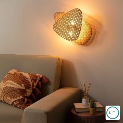 Raya Ratan Wall Lamp | Lamps by Lit Lamps - Sustainable Mindful Lighting. Item works with boho & coastal style