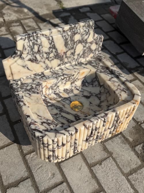 Calacatta Viola Marble Sink: Ribbed, Hand Carved, Wall Mount | Water Fixtures by AEGEAN MARBLE ARTISAN ATELIER