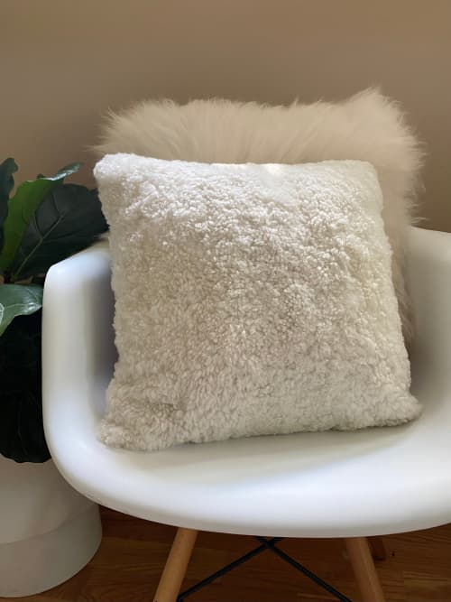 White shop sheepskin cushion