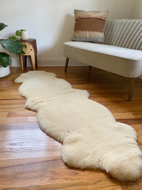 Double Shorn Golden Ivory Sheepskin | Area Rug in Rugs by East Perry. Item made of wool with fiber