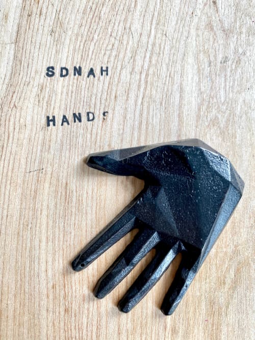 GEO hand, various finishes. | Ornament in Decorative Objects by Shayne Fox Hardware. Item made of cement
