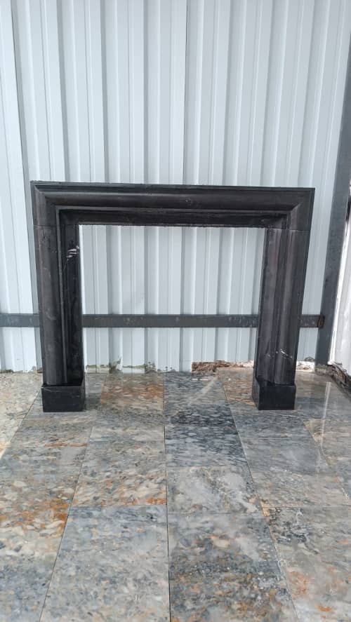 Hand Carved Nero Marquina Marble Fireplace Mantel - Custom Order | Fireplaces by AEGEAN MARBLE ARTISAN ATELIER