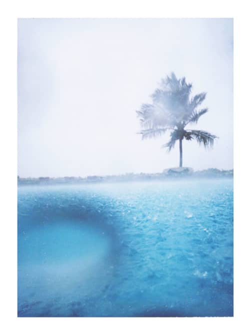 The warm rain makes the blue paint splatter | Photography by She Hit Pause. Item made of paper