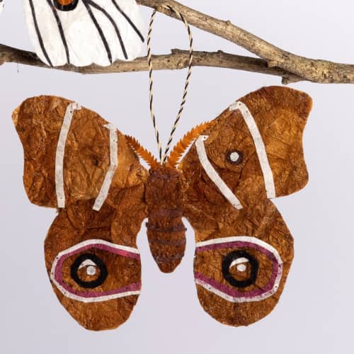 Madagascar Silk Moth Ornament - Tan | Decorative Objects by Tanana Madagascar. Item composed of wool and fiber