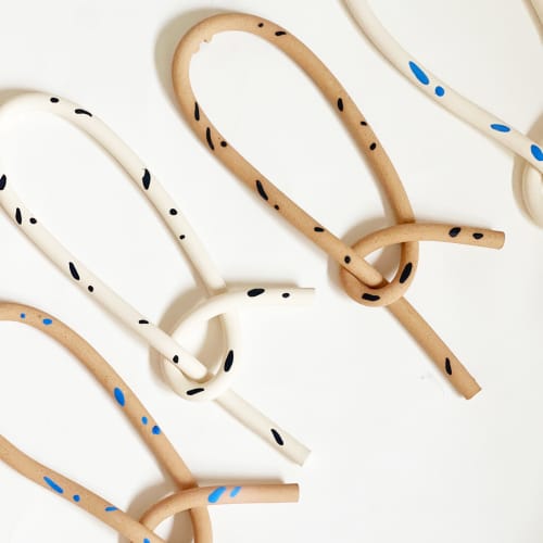 Clay Object 25 - Blue Dots Long Knot | Sculptures by OBJECT-MATTER / O-M ceramics