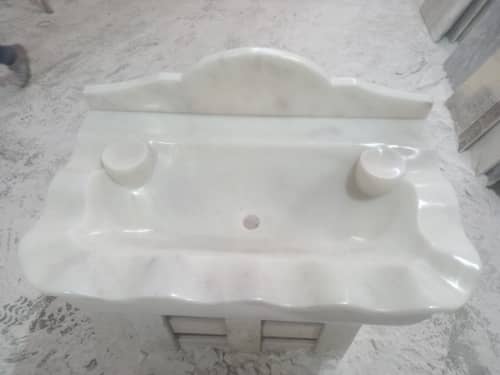 Hand Carved Carrara Marble Sink: 21”x34” Wall Mount Washbasin | Water Fixtures by AEGEAN MARBLE ARTISAN ATELIER