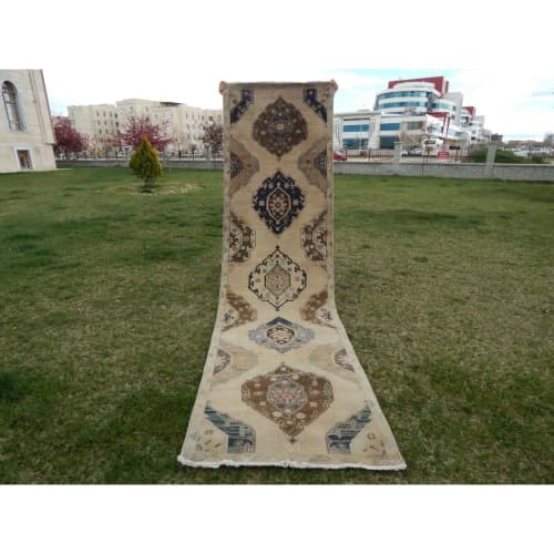 Vintage Organic Wool Tribal Style Faded Turkish Runner Rug | Rugs by Vintage Pillows Store. Item made of cotton