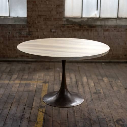 Round Wood + Bronze Pedestal Base Dining Table | Tables by Alabama Sawyer. Item composed of oak wood and metal