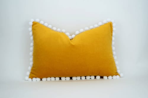 mustard pillow with pom poms // yellow pom pom cushion | Pillows by velvet + linen